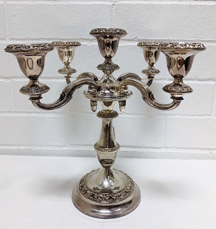 Silver plate Candelabra. Also many silver plate teapots, coffee pots, bowls, comports, jugs and trays.